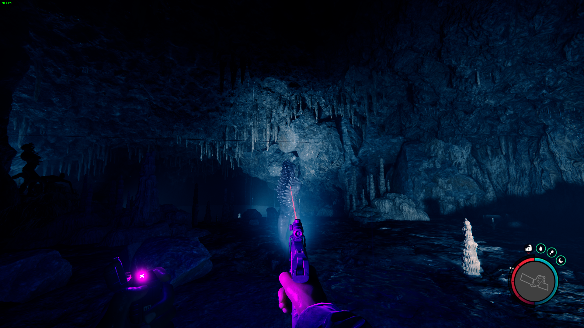 Navigate through the cavern with caution to find the flashlight attachment.