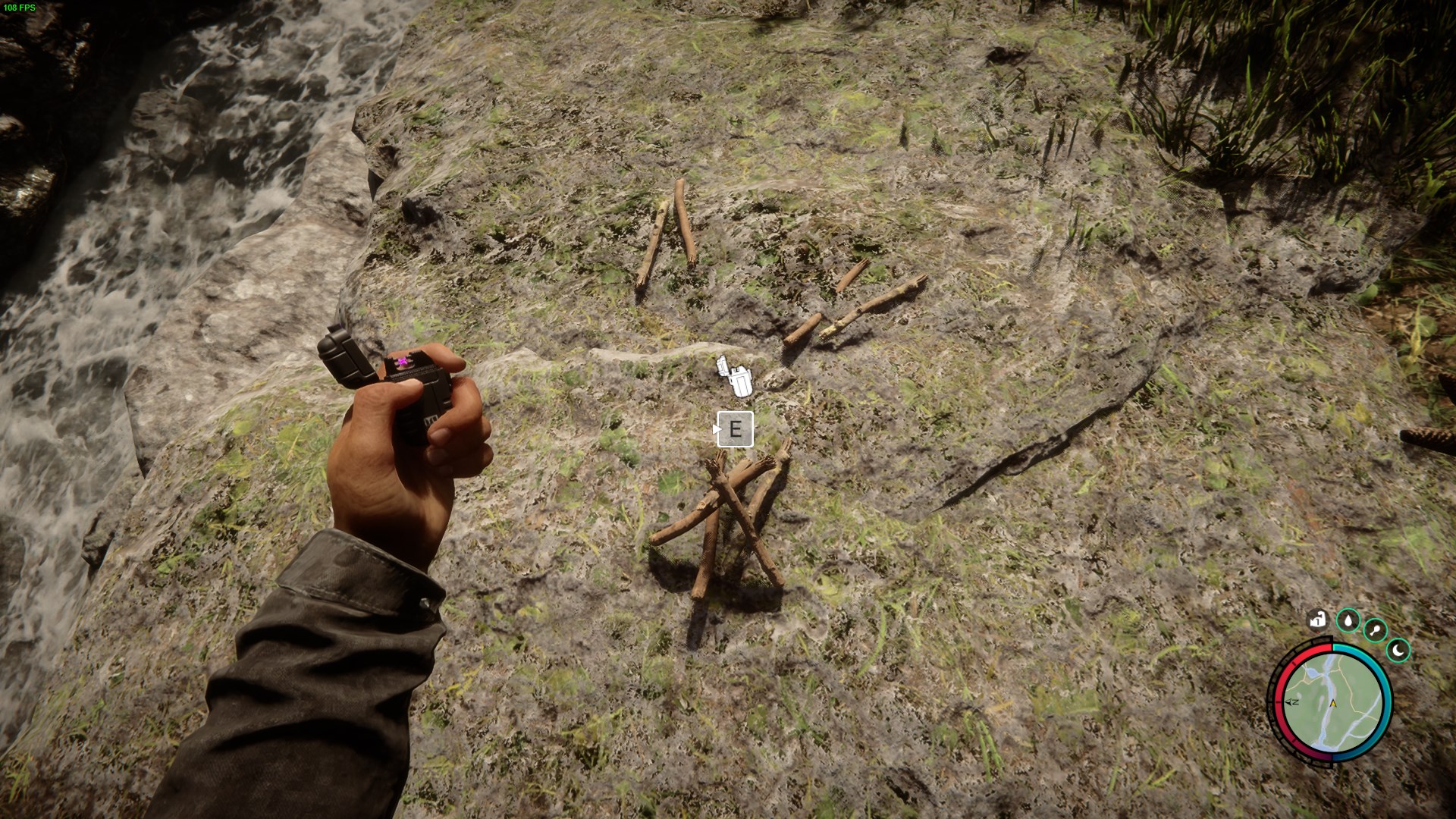 The crucial moment of igniting your meticulously prepared stack of sticks with a lighter.