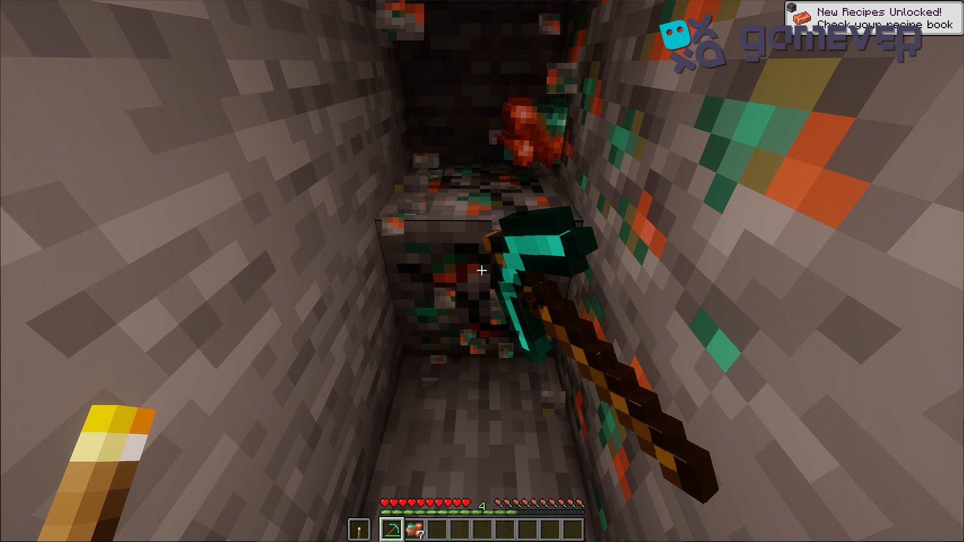 Mining copper ore in Minecraft