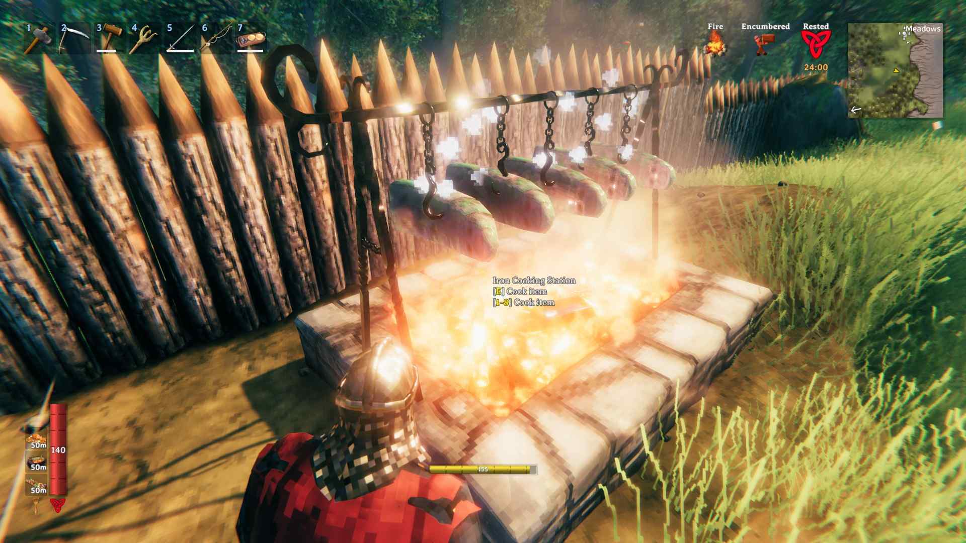 Cook Seeker Meat over a fire in an Iron Cooking Station in Valheim Bog Witch