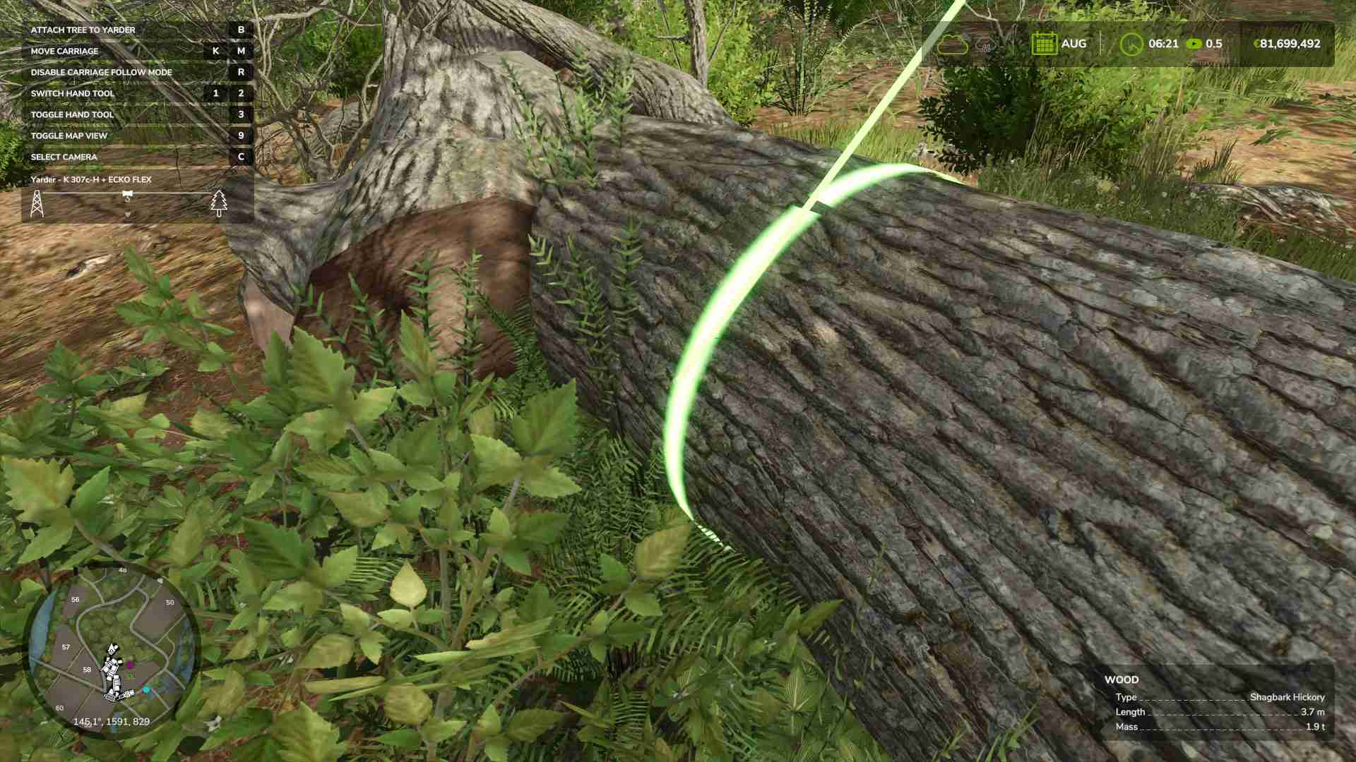 Attach the yarder to freshly cut logs in Farming Simulator 25