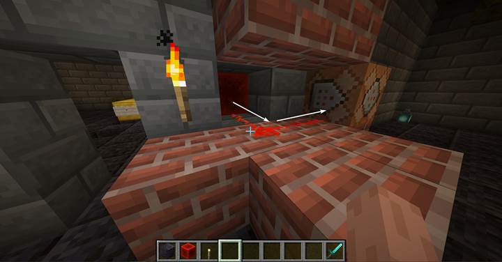 Break the cage by powering a command block through redstone dust.