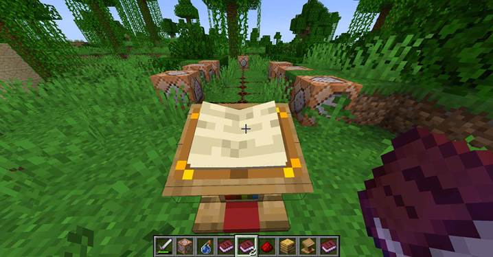 Połóż książkę na mównicy w Minecrafcie.