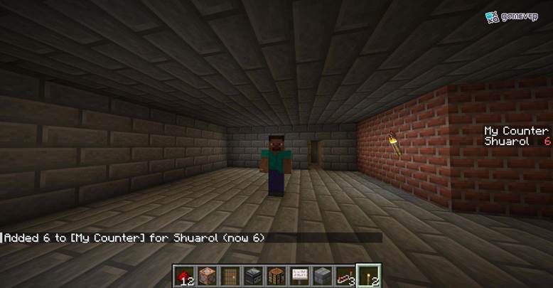 Añade puntos de puntuación al jugador usando un botón de redstone y un bloque de comando en Minecraft.